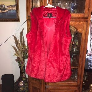 Adrienne Landau  red vest
